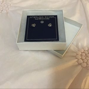 They are earrings they are silver they are from belk